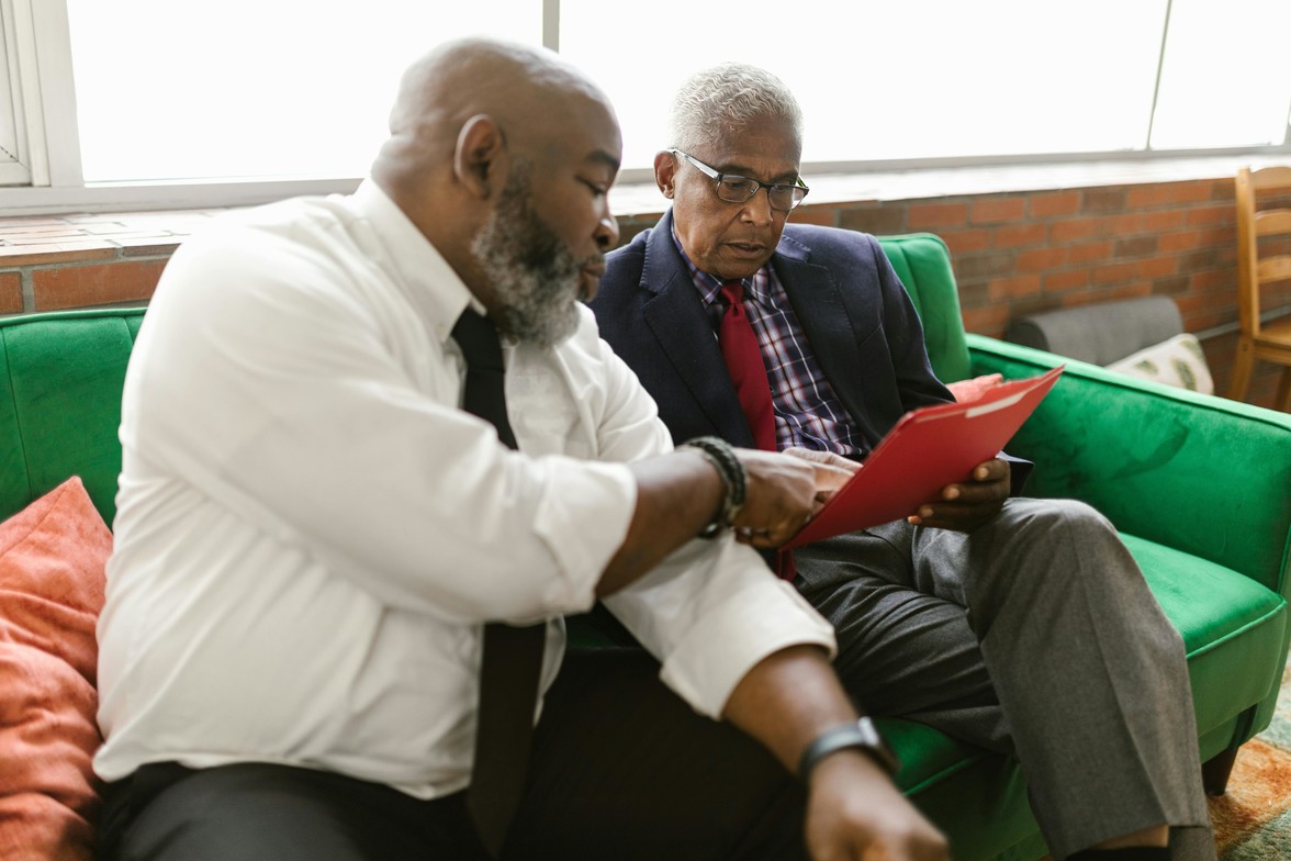 Millennial caregiver in Toronto helping aging parent with care planning and document review. Family caregiving support for aging parents in Ontario.